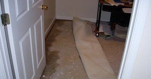 Water Damage In Bedroom After Flooding Incident