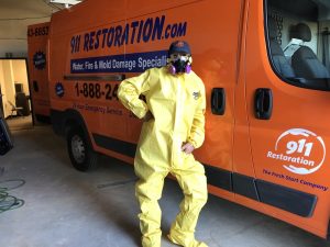 A Mold Cleanup Technician After a Successful Job